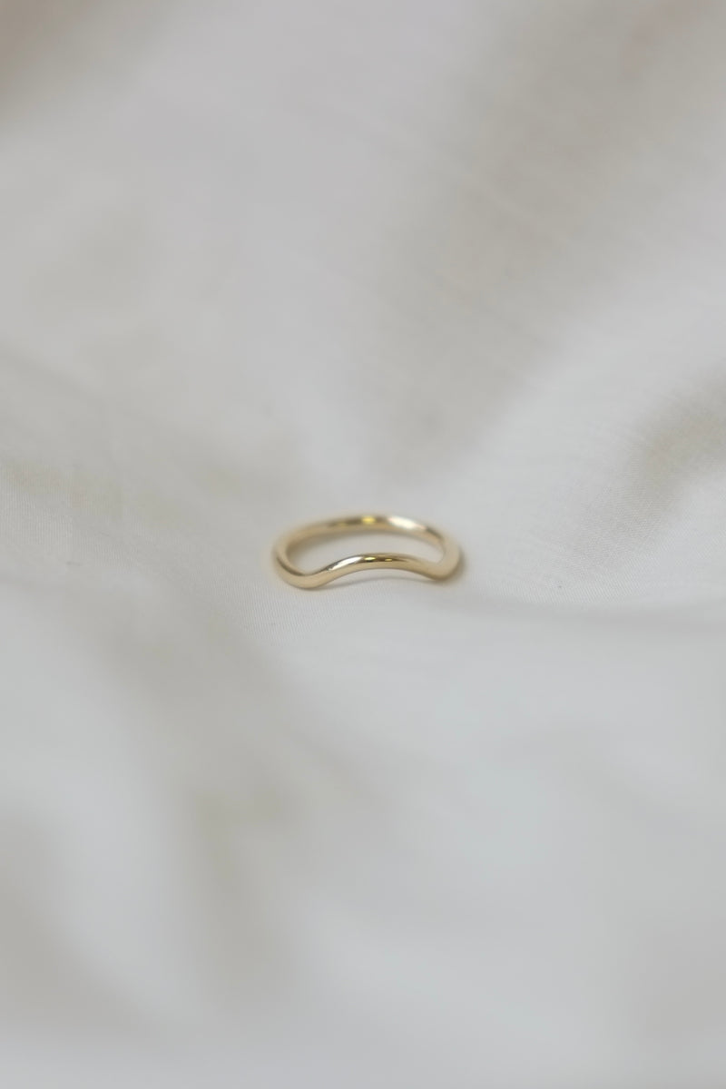 Detail of slim gold ring with hammered texture, crafted from 1.8mm round wire
