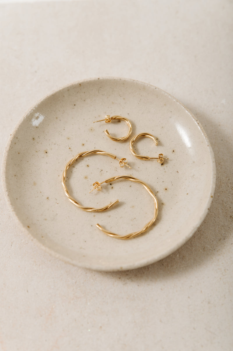 Handmade gold plated sterling silver twisted hoops in 2 sizes. Classic hoops for everyday wear. Simple yet statement jewellery 