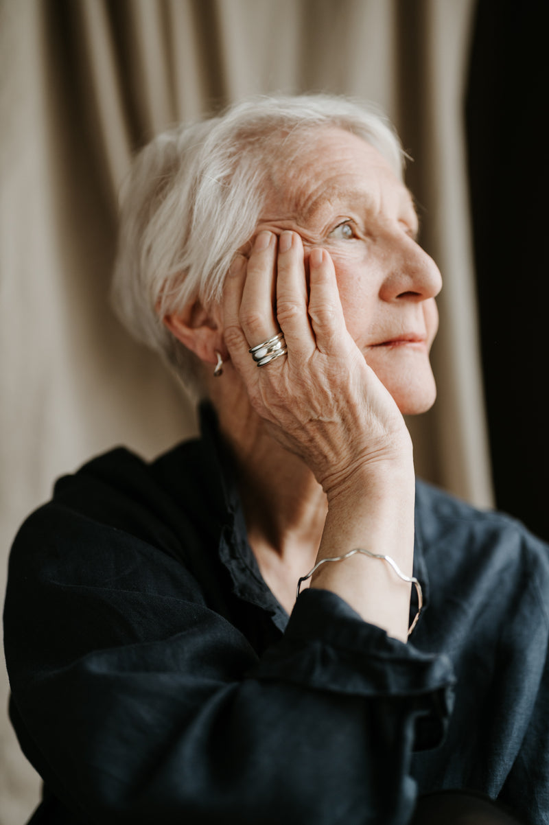 Mature lady wearing studio adorn Recycled Sterling Silver Wiggle Bangle 
