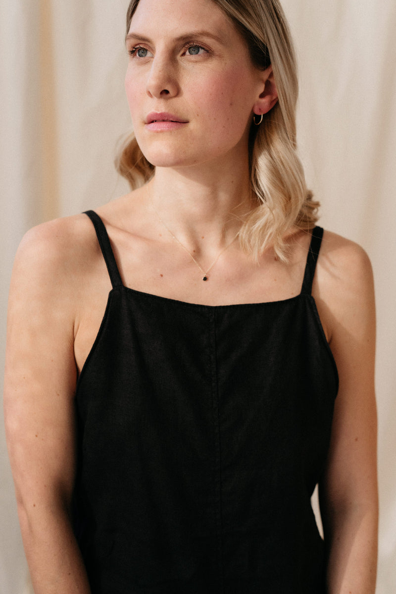 Studio Adorn front profile of model wearing recycled gold zero waste pebble necklace on fine curb chain | minimalist gold necklace