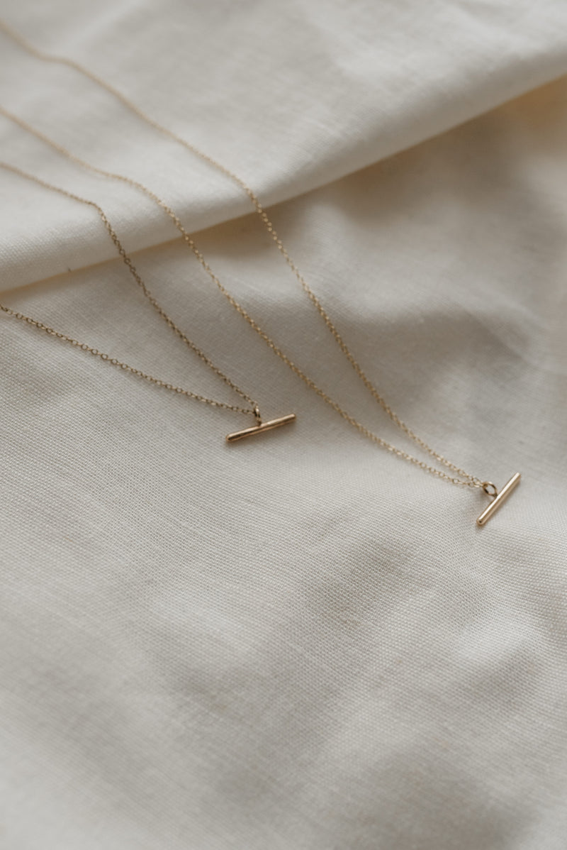 Studio Adorn 9ct gold minimal bar necklaces in polished and matte finishes 
