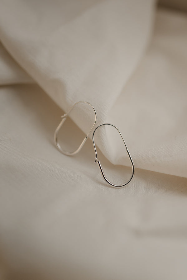 Chunky Oval silver statement hoop earrings handmade by Studio Adorn