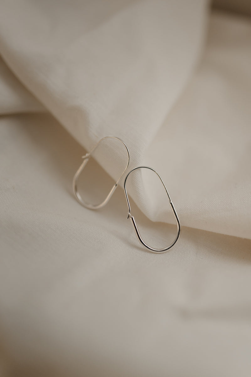 Chunky Oval silver statement hoop earrings handmade by Studio Adorn