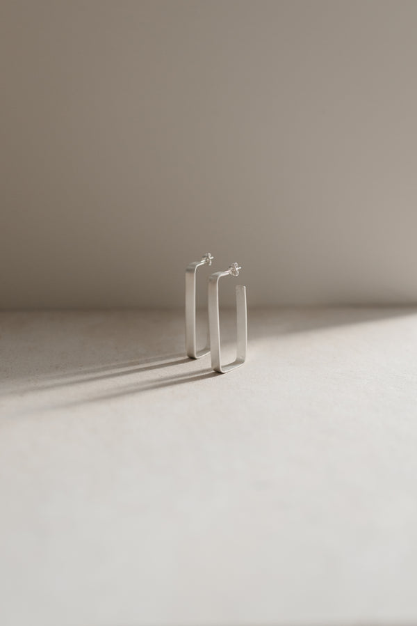 Statement rectangle chunky silver hoop earrings handmade by Studio Adorn