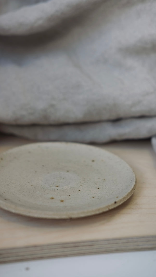 Speckled stoneware jewellery dish handmade by Eleanor Torbati with minimalist design