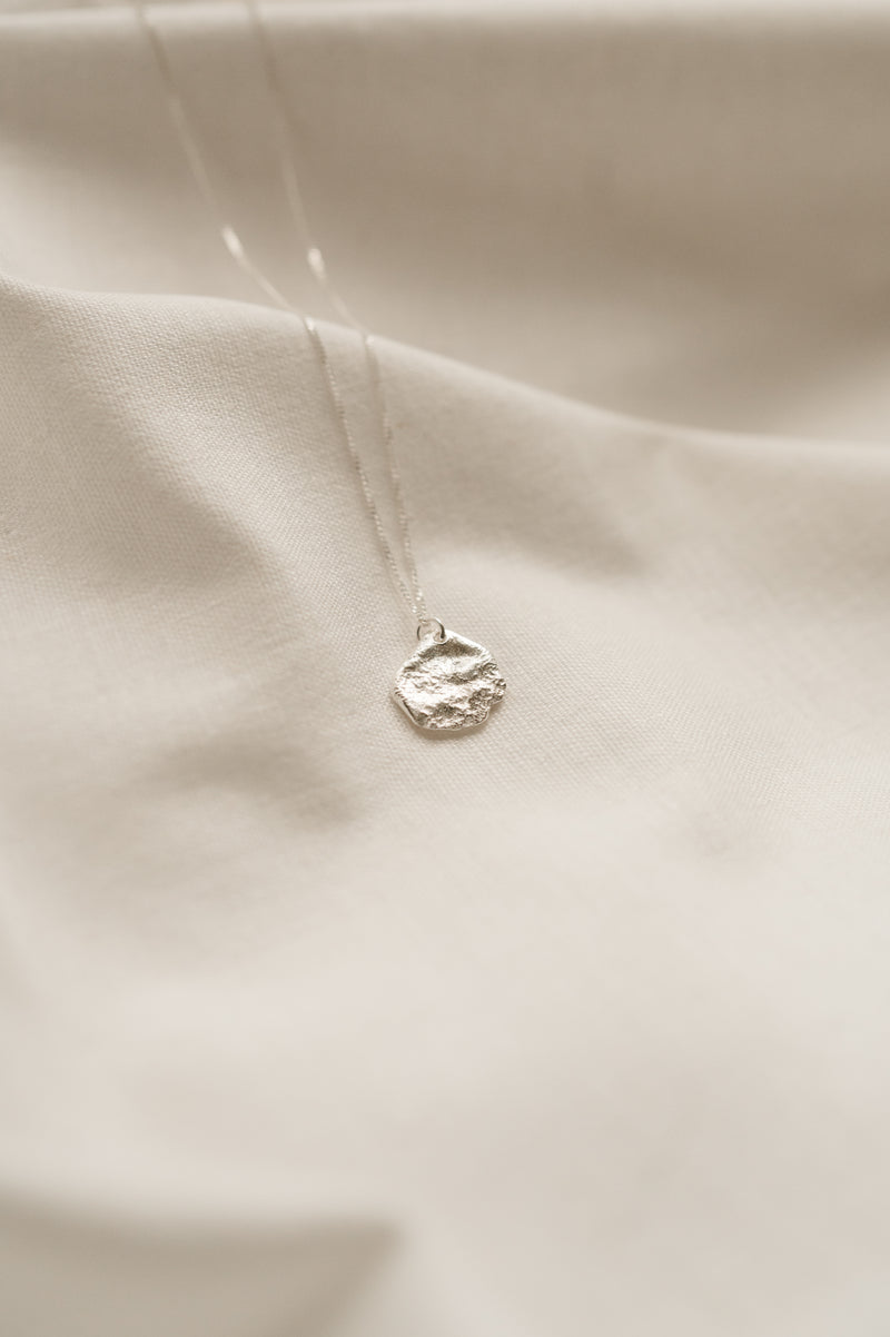 Sterling Silver Flux Pendant Necklace handcrafted by jewellers at Studio Adorn Jewellery Norwich