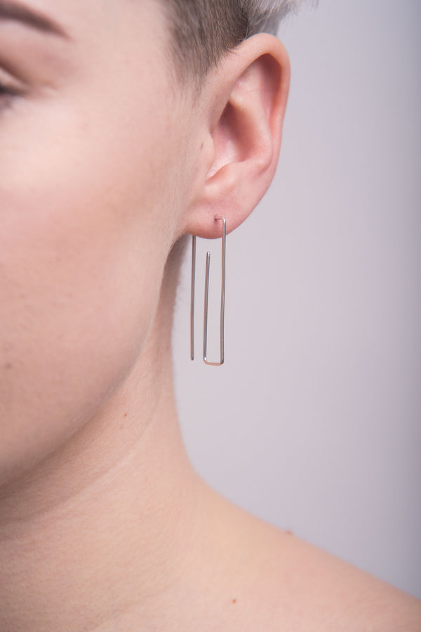 Silver ear pin threads handmade by Studio Adorn