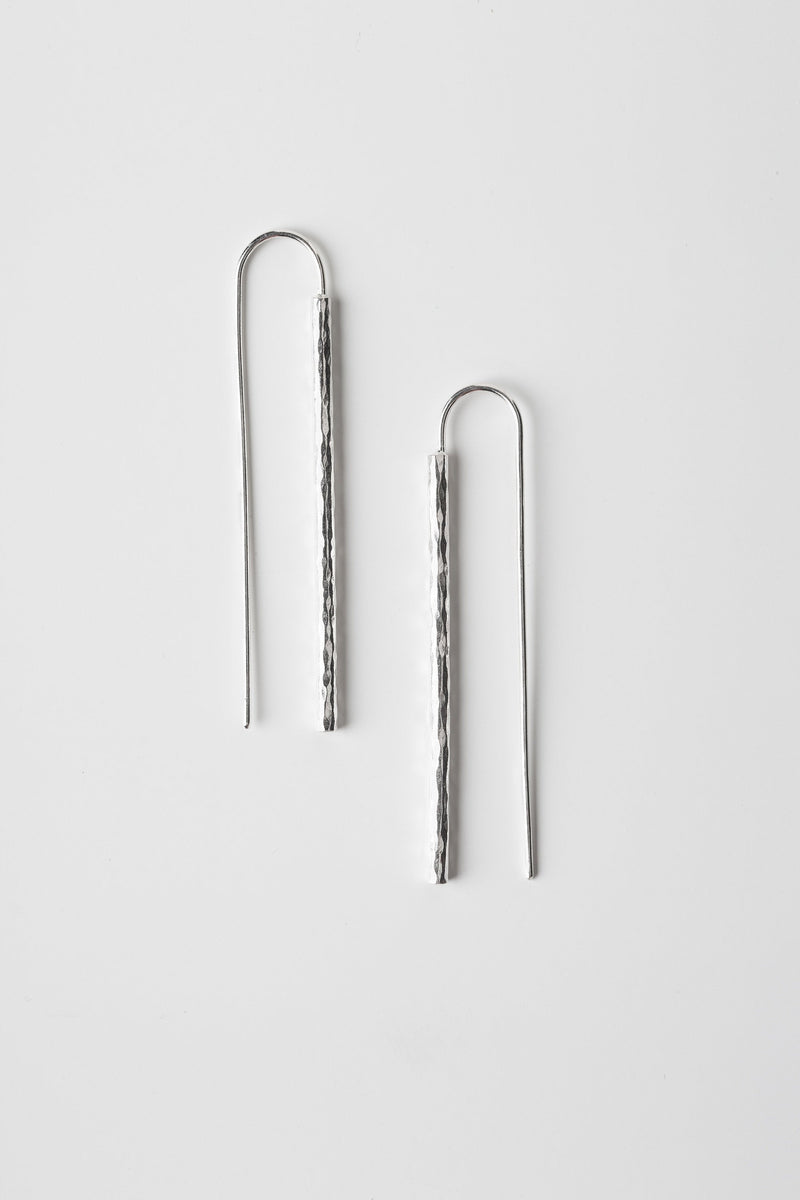 Long hammered statement silver bar thread earrings handmade by Studio Adorn  Edit alt text