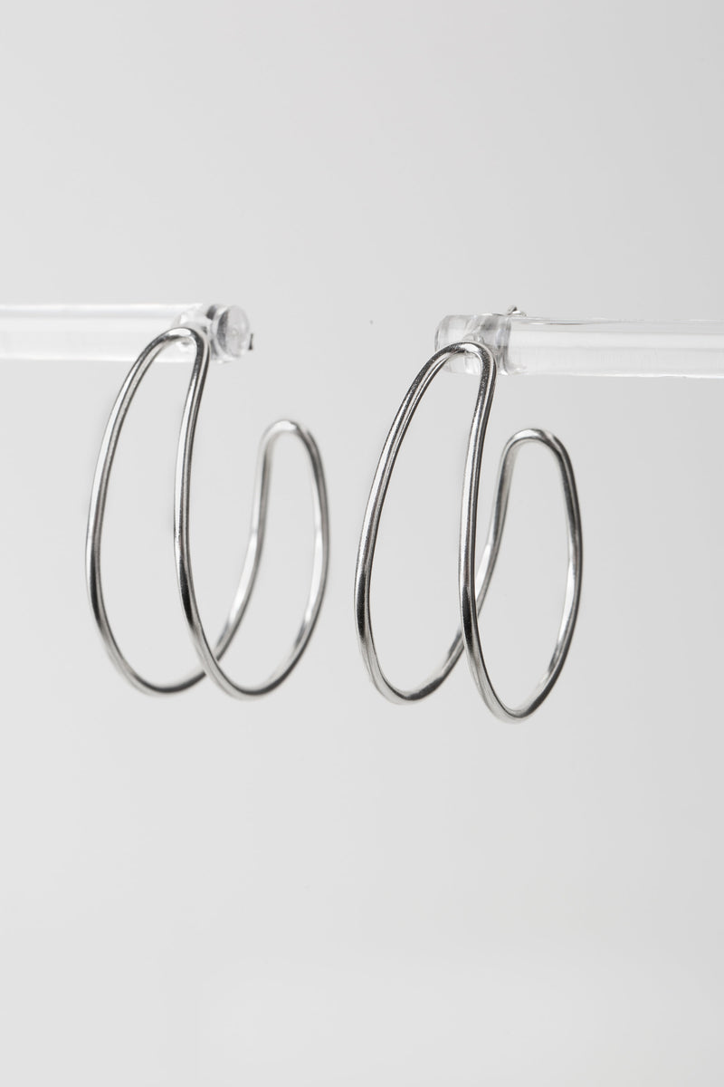 Silver loopy hoop earrings handmade by Studio Adorn