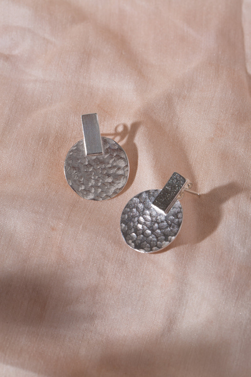 Silver hammered disc stud earrings handmade by Studio Adorn