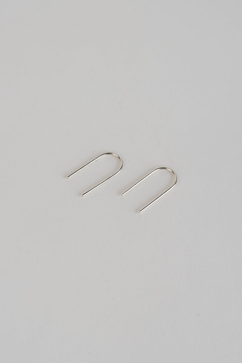 Silver arch ear pins handmade by Studio Adorn