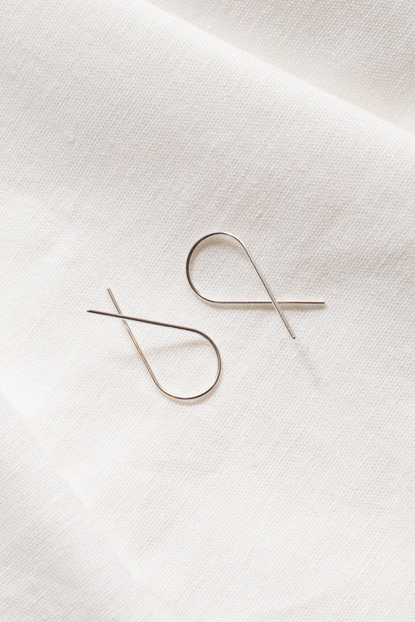 Twist silver ear pins handmade by Studio Adorn