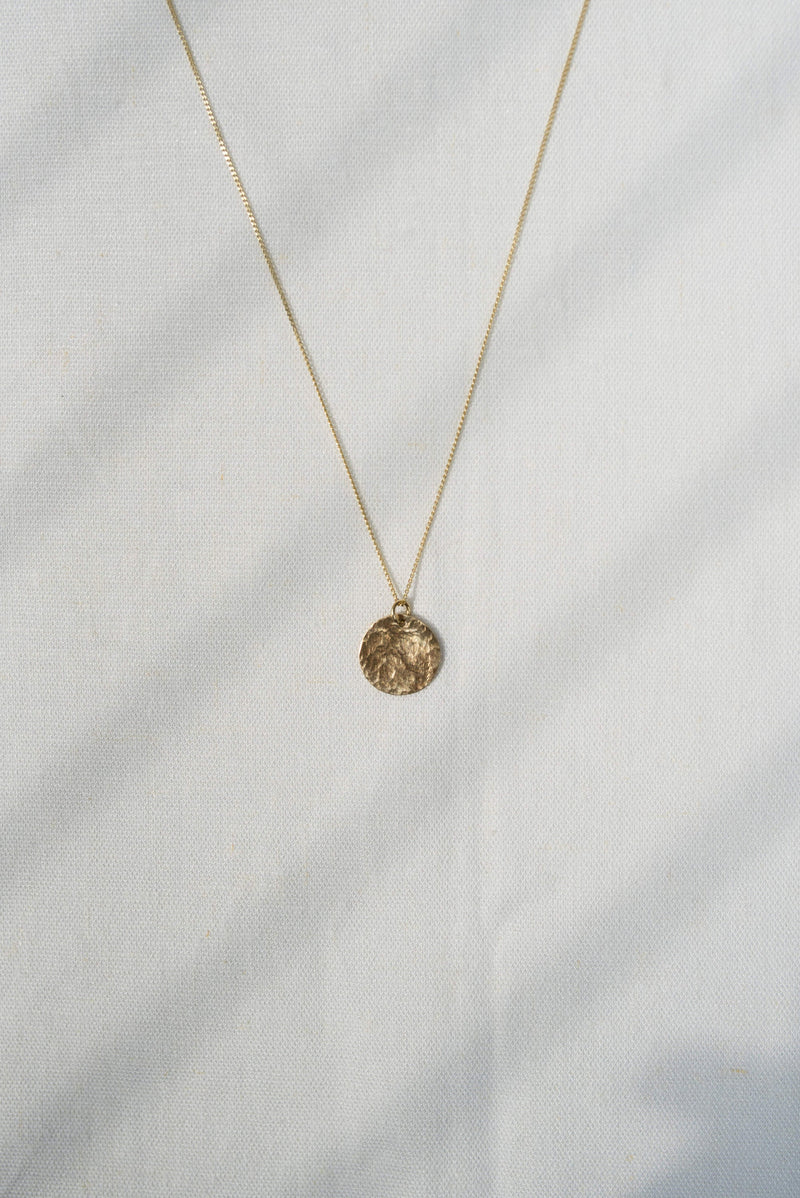 Studio Adorn 9 carat recycled hammered gold disc necklace on diamond cut curb chain