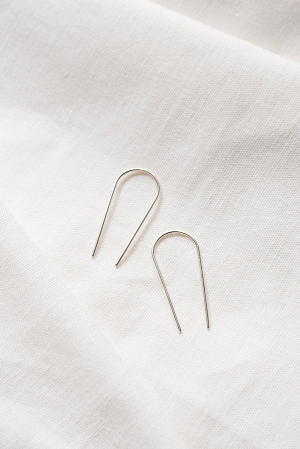 Long silver ear pin threads handmade by Studio Adorn 