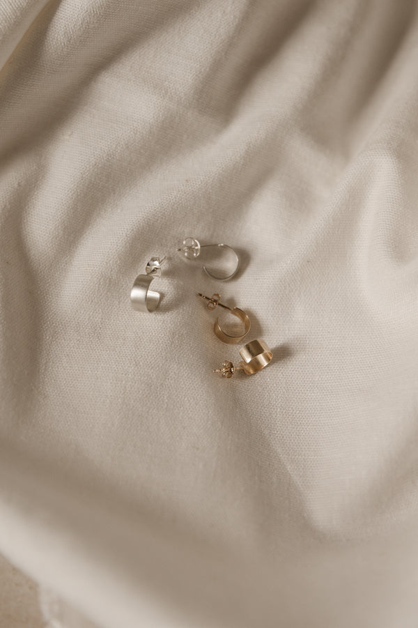 mini huggy hoops in silver and 9ct gold
