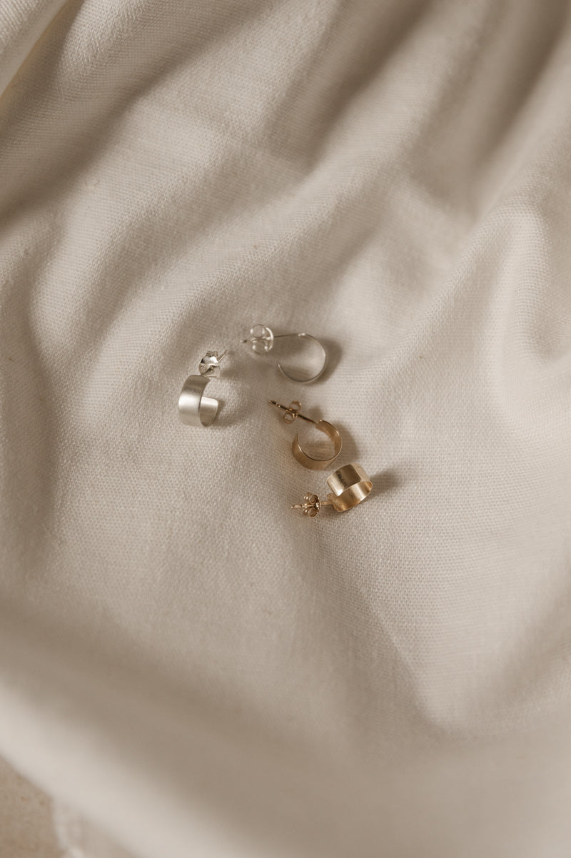 mini huggy hoops in silver and 9ct gold