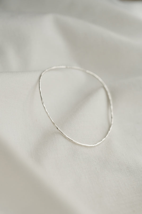 Hammered Organic Shaped Bangle made by Studio Adorn Jewellery from Recycled Silver