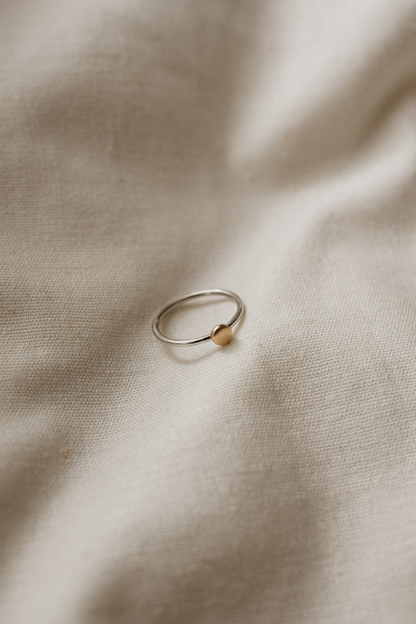 Eco-friendly stackable rings in solid gold and silver handmade by Studio Adorn