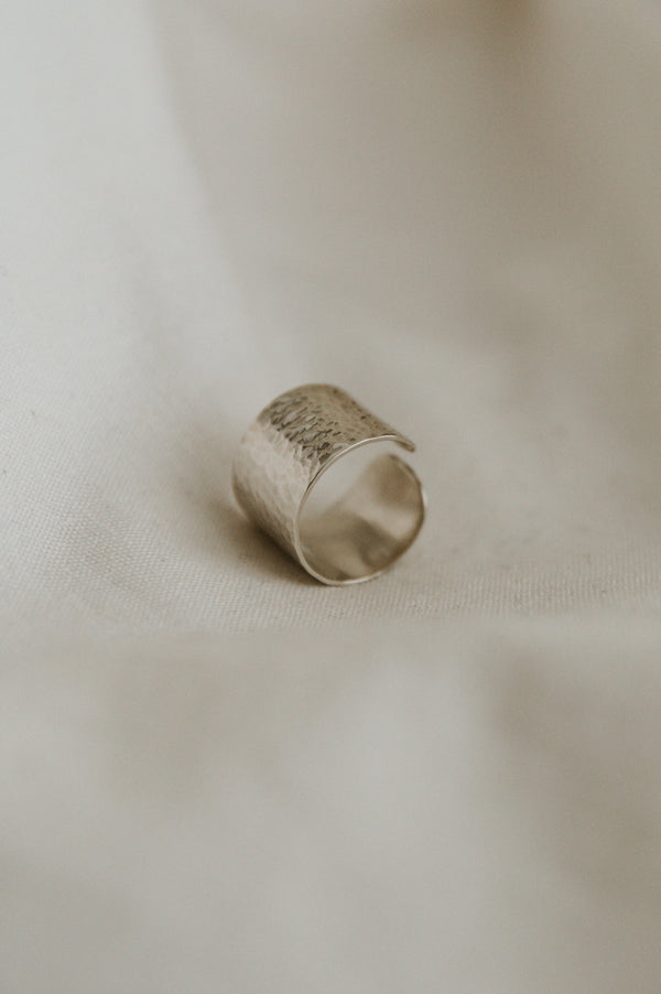 Studio Adorn Jewellery - Hammered Statement Gap Ring on a neautral background