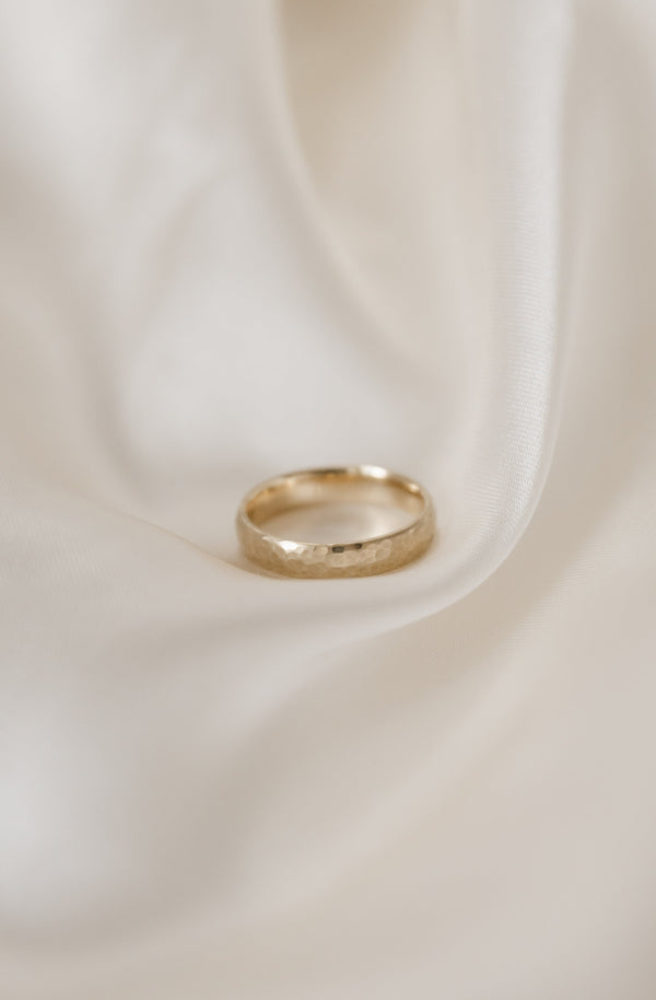 9ct Gold 4mm Hammered Court Wedding Ring by Studio Adorn Jewellery