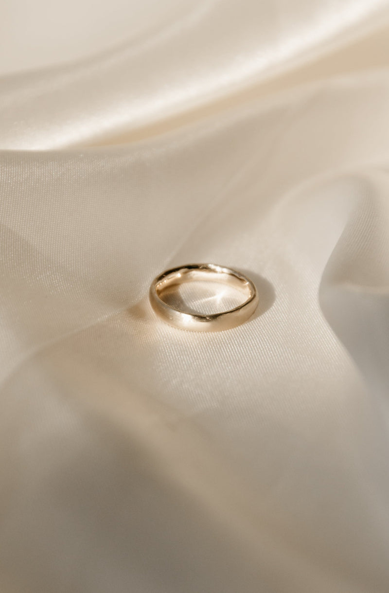 handmade 9ct gold wedding ring